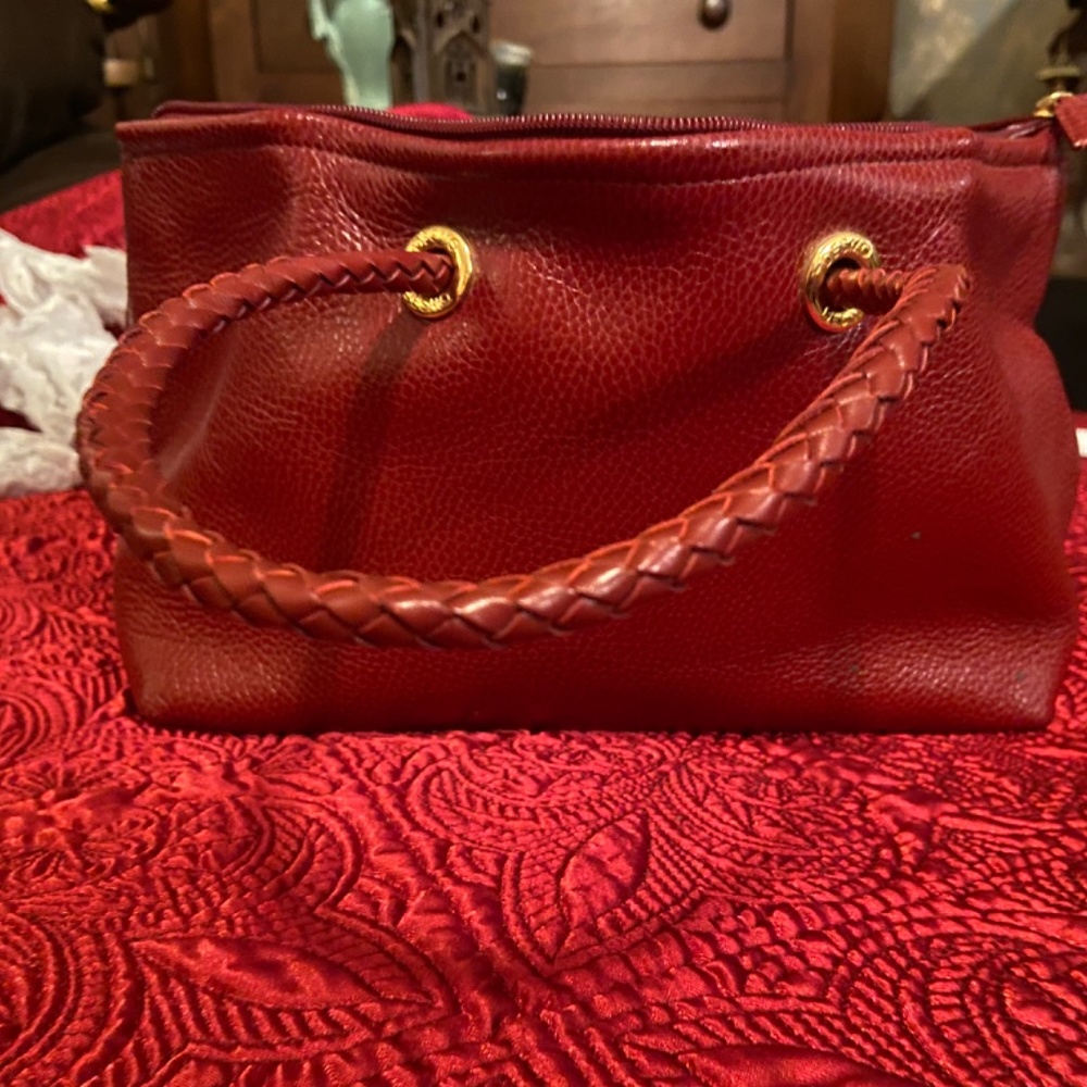 Lined, genuine  pebble leather Desmo handbag